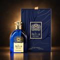 Satwa 100ml Eau de Parfum blue bottle and original navy box on dark warm background
